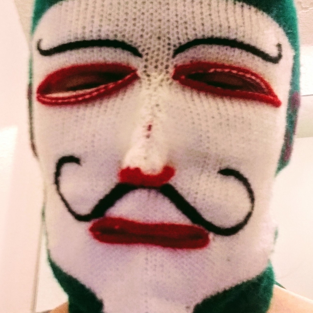 Hand knitted devil's mask